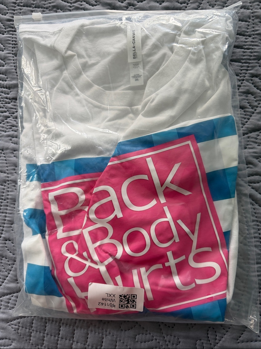 Bella Canvas White Womens Tee with Pink & Blue Back and Body Hurts Graphic